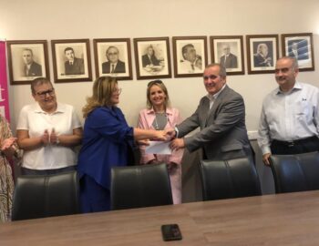 The GWU with a donation to the Marigold Foundation